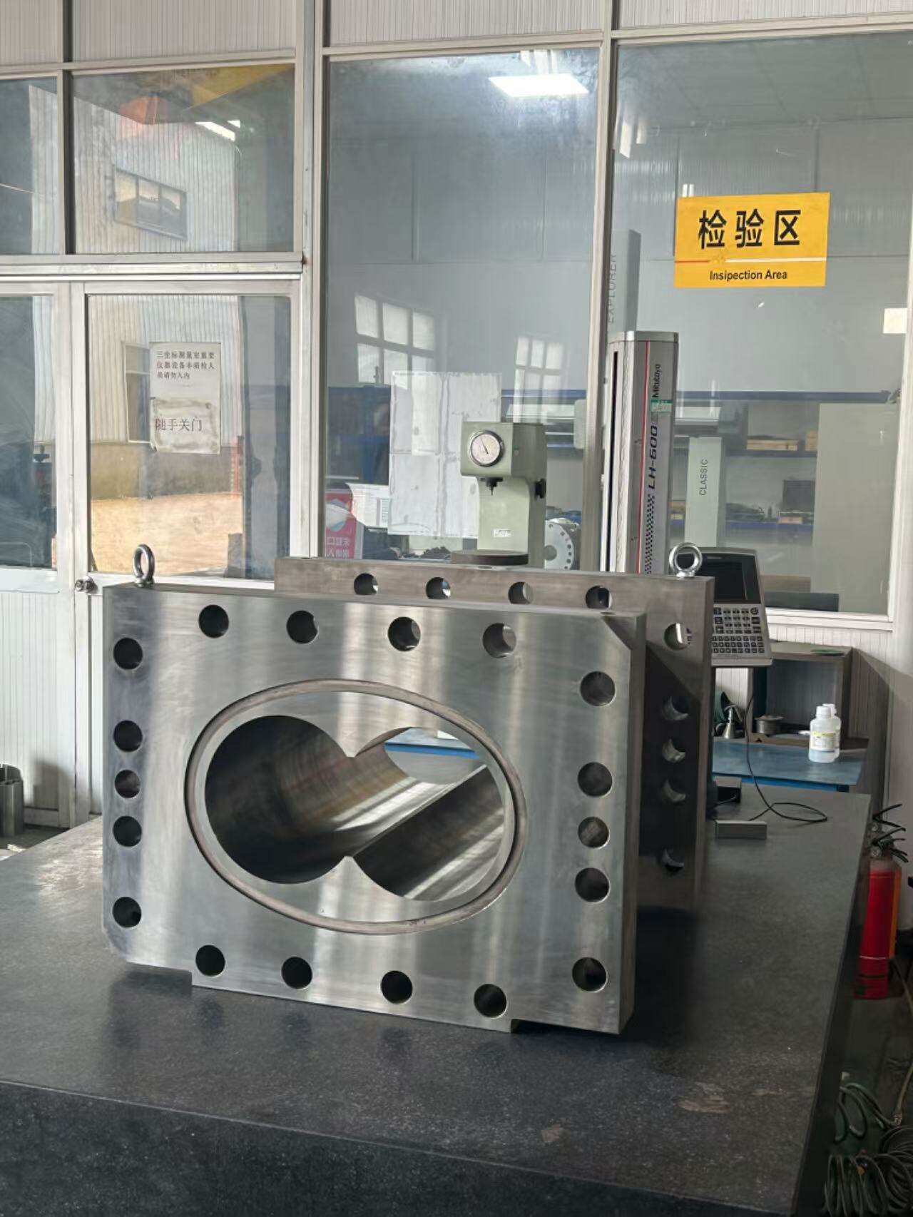 Finished twin-screw barrel with machined bore in the inspection area