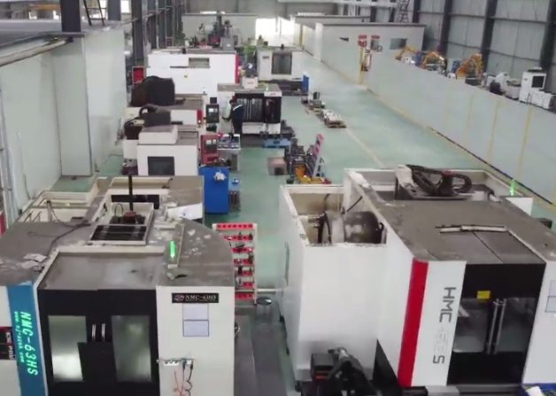 Production hall aisle with machining equipment